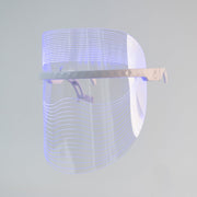 Magic Glow 7-in-1 LED BeautyShield by GYM IN A BOX® – premium light therapy face mask featuring 7 clinically-targeted LED wavelengths for anti-aging, acne treatment, skin brightening, and wrinkle reduction. Lightweight, hands-free, USB rechargeable, and designed with transparent NASA-inspired technology for at-home professional skincare