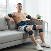 Male model sitting outdoors wearing a full 5-piece muscle-activation wearable set on arms, waist, and thighs.