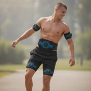 Athletic men and women  wearing GYM IN A BOX full 5-in-1 muscle-engagement wearable set on waist, arms, and thighs, demonstrating movement and active lifestyle.